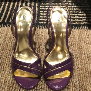 Baker’s purple and gold sandals